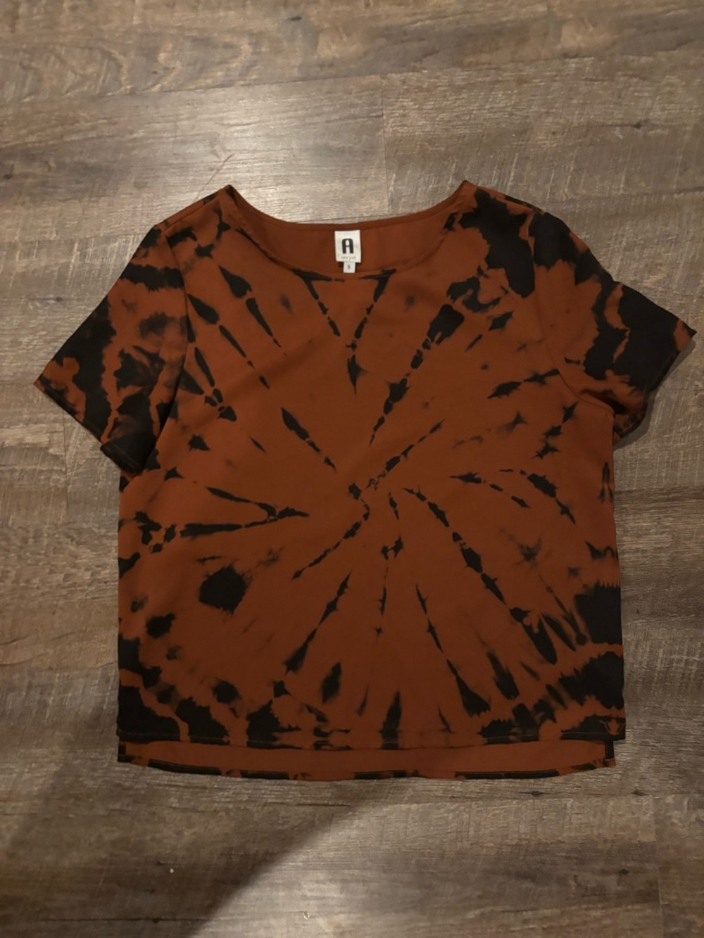 A New York Tie-Dye Short Sleeve Tee in Rust and Black